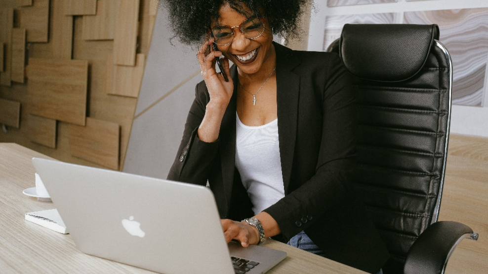 A small business owner chatting on a call